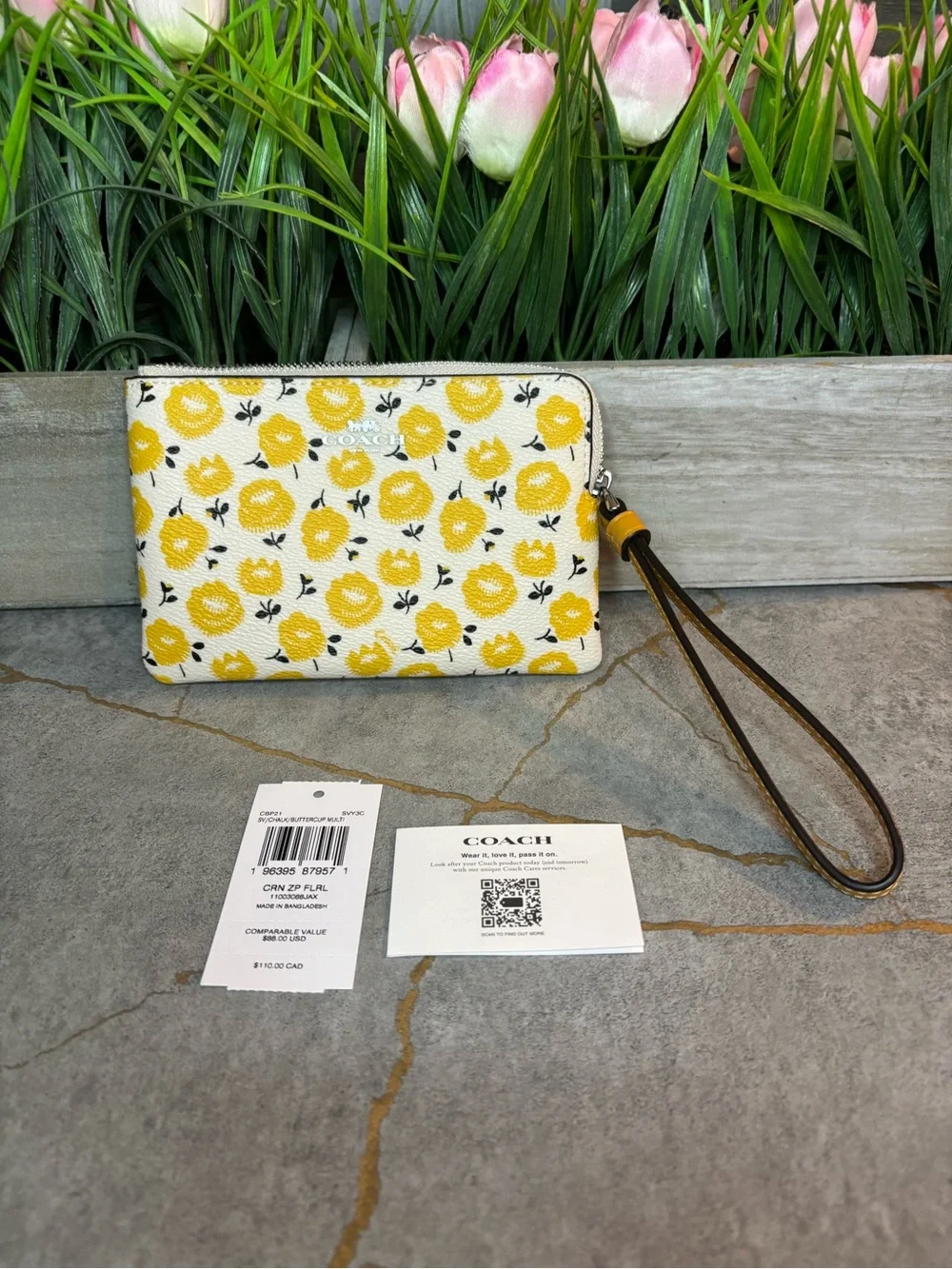 COACH NWT Yellow Floral Wristlet Pouch with Brown Strap